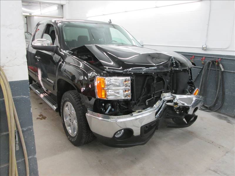 Image of a truck with a crushed front end.